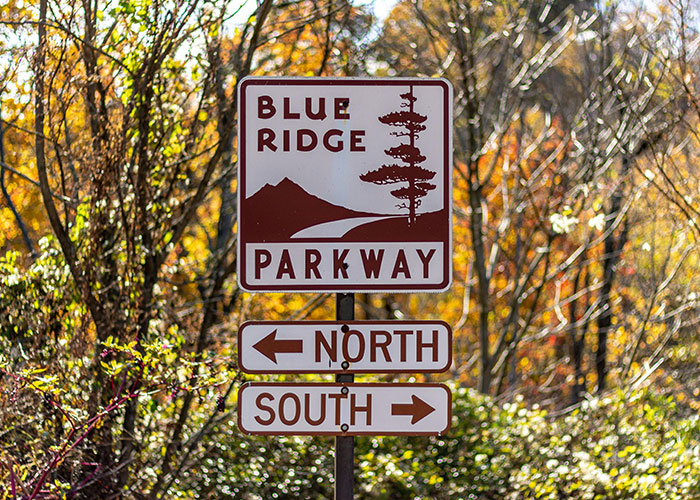 Blue Ridge Parkway road sign highlighting locations linked to disappearances