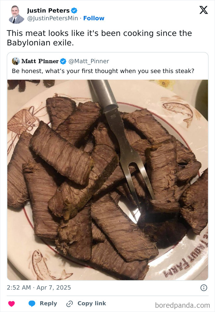 Plate of sliced overcooked steak with meat fork on fish-decorated plate