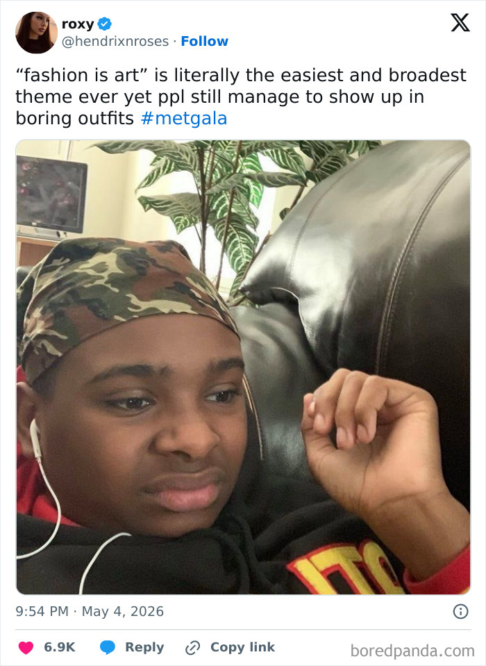 A person with a camo bandana and earbuds reacting to MET Gala 2026 celebrity guests. Funniest reactions.