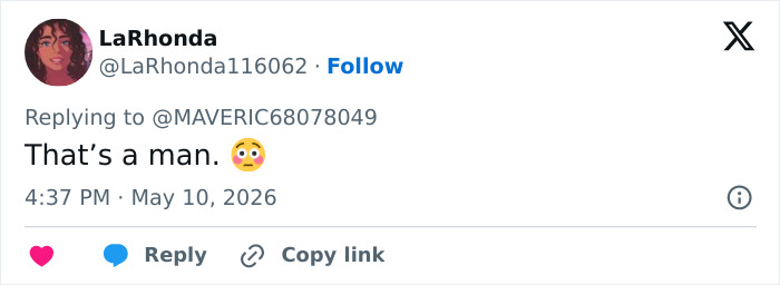 A social media comment reading "That's a man." with a surprised emoji, relating to male body accusations. A social media comment reading "That's a man." with a surprised emoji, relating to male body accusations.