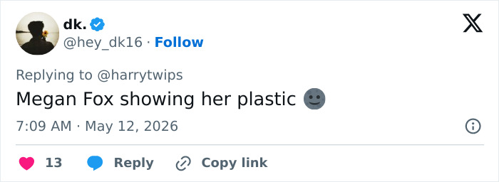 A tweet from dk. saying "Megan Fox showing her plastic" with a smiling emoji, implying plastic surgery.