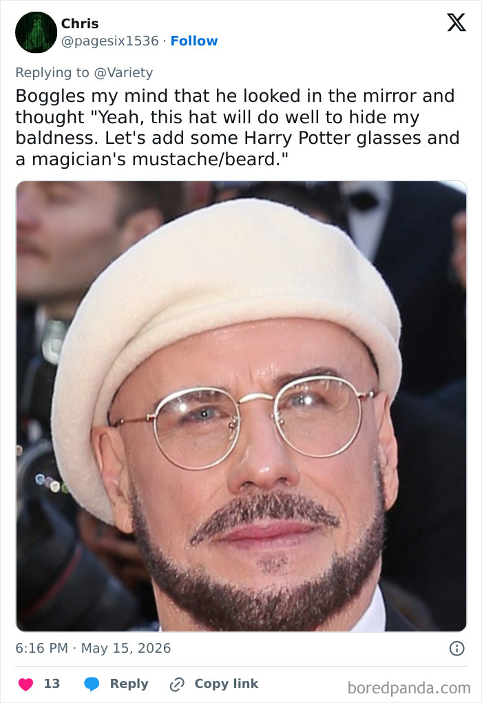Close-up of John Travolta in new look with beret, glasses, mustache, and beard