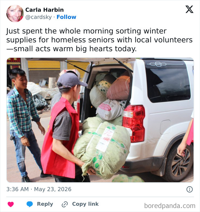 Volunteers loading winter supplies for homeless seniors into a car to help with kindness and love