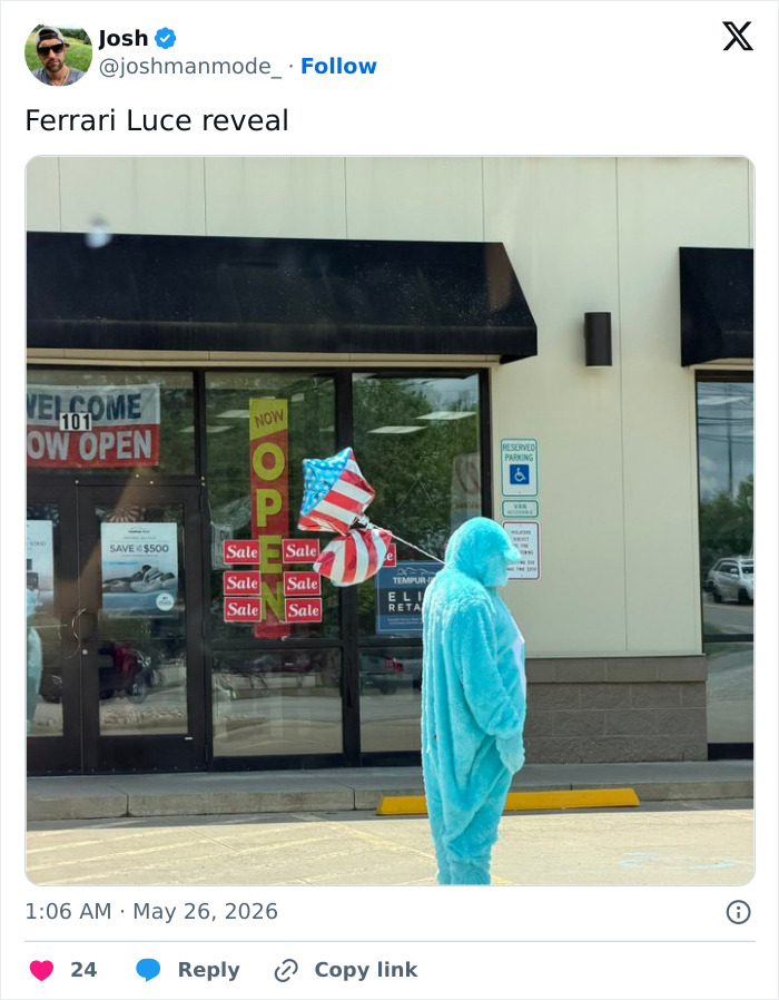 Person in blue costume outside store with balloons referencing Ferrari Luce reveal