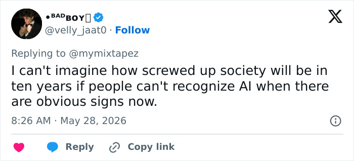 Tweet expressing concern about society not recognizing AI signs