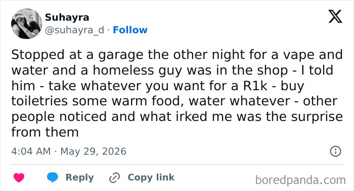 Man offering to buy warm food and toiletries for a homeless person at a garage shop