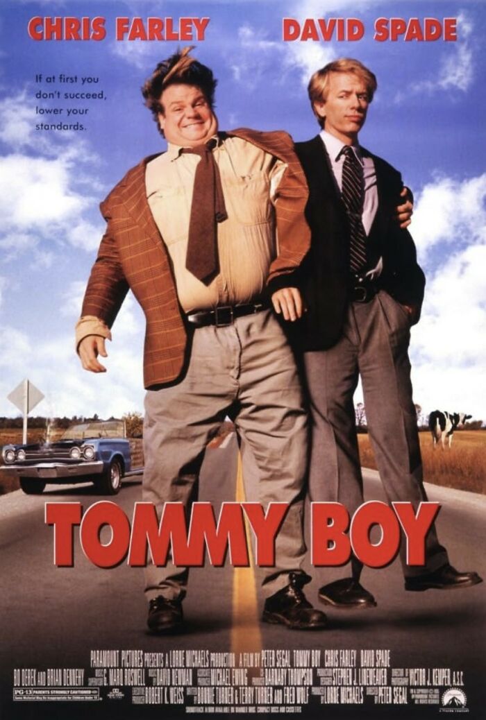 Tommy Boy movie poster showing Chris Farley and David Spade on a road