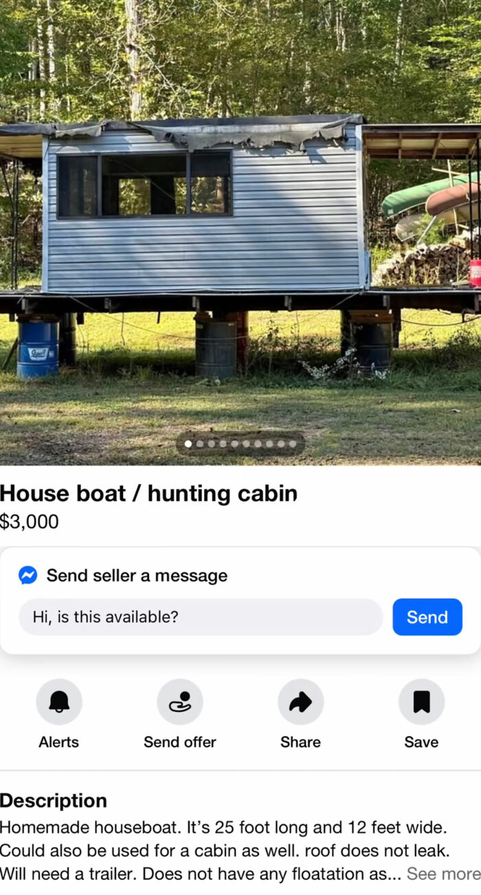Homemade house boat hunting cabin elevated on barrels