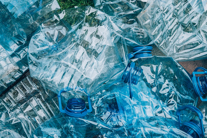 Pile of crushed plastic bottles representing environmental anxiety factors