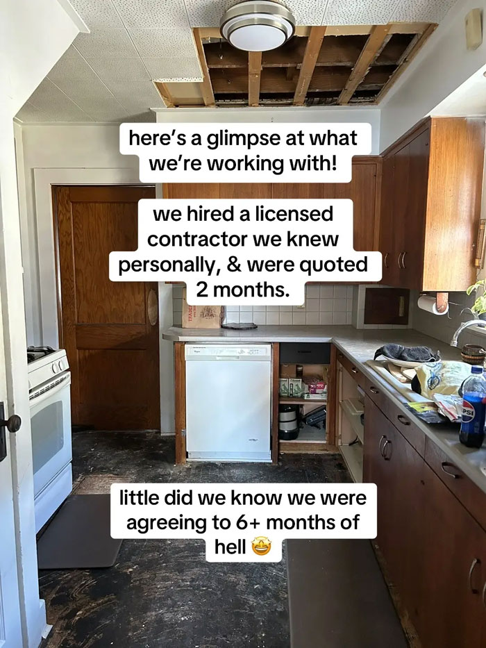 A kitchen with exposed ceiling beams and torn-up flooring, showing the poor work of an expensive contractor.