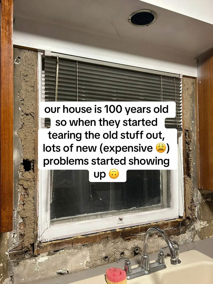 A kitchen window with exposed plaster, showing extensive home damage after an expensive contractor's work.