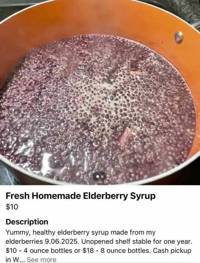 Fresh homemade elderberry syrup simmering in pot