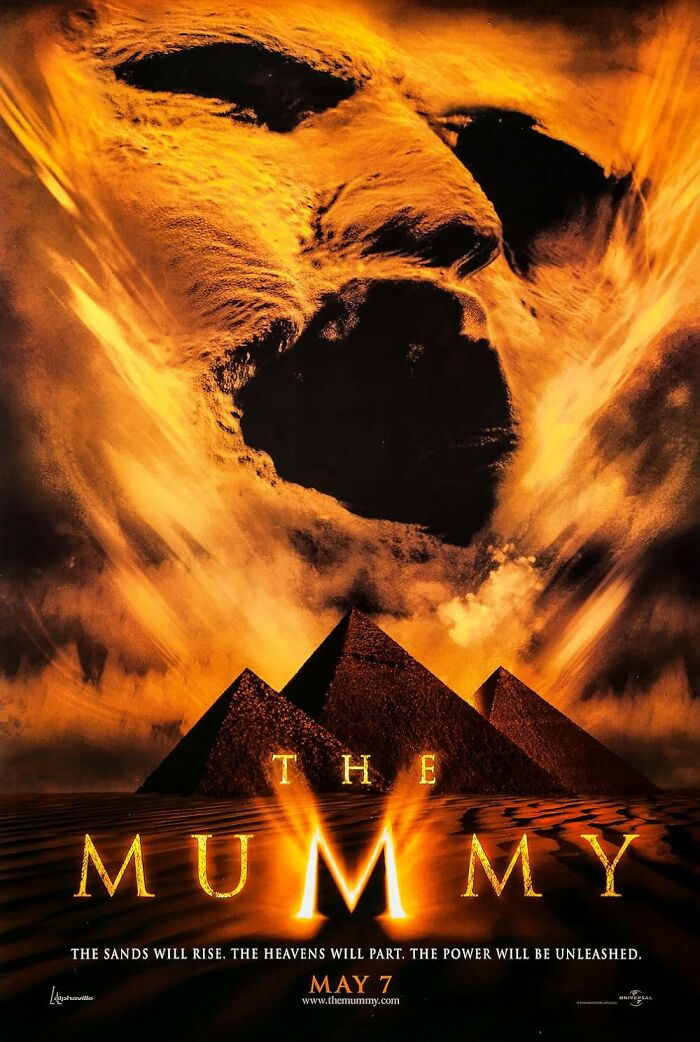 The Mummy movie poster with pyramids and a giant sand monster face