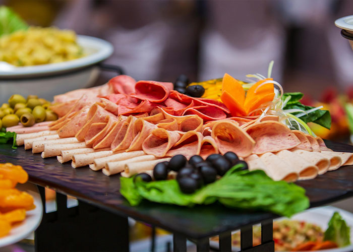 Close-up of a catered meat and olive platter representing Super Bowl platter in wrongful termination case Close-up of a catered meat and olive platter representing Super Bowl platter in wrongful termination case