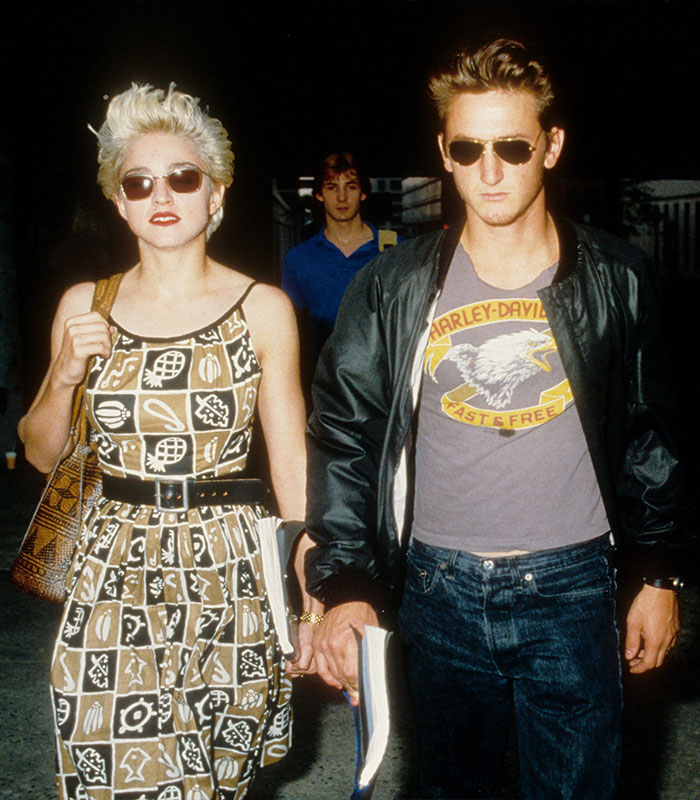 Madonna and Sean Penn holding hands walking at night Madonna and Sean Penn holding hands walking at night