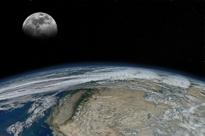 Partial lunar eclipse over Earth and moon