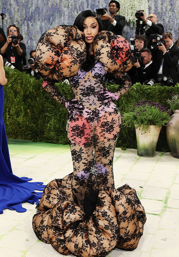 Cardi B in a sheer black lace bodysuit with oversized puffed sleeves, one of the worst dressed stars at Met Gala 2026.
