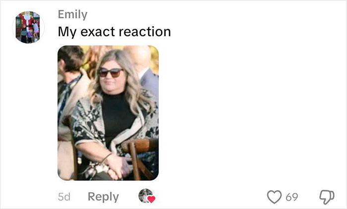 A woman wearing sunglasses and a patterned shawl, a reaction to a mother-in-law's wedding dress. A woman wearing sunglasses and a patterned shawl, a reaction to a mother-in-law's wedding dress.