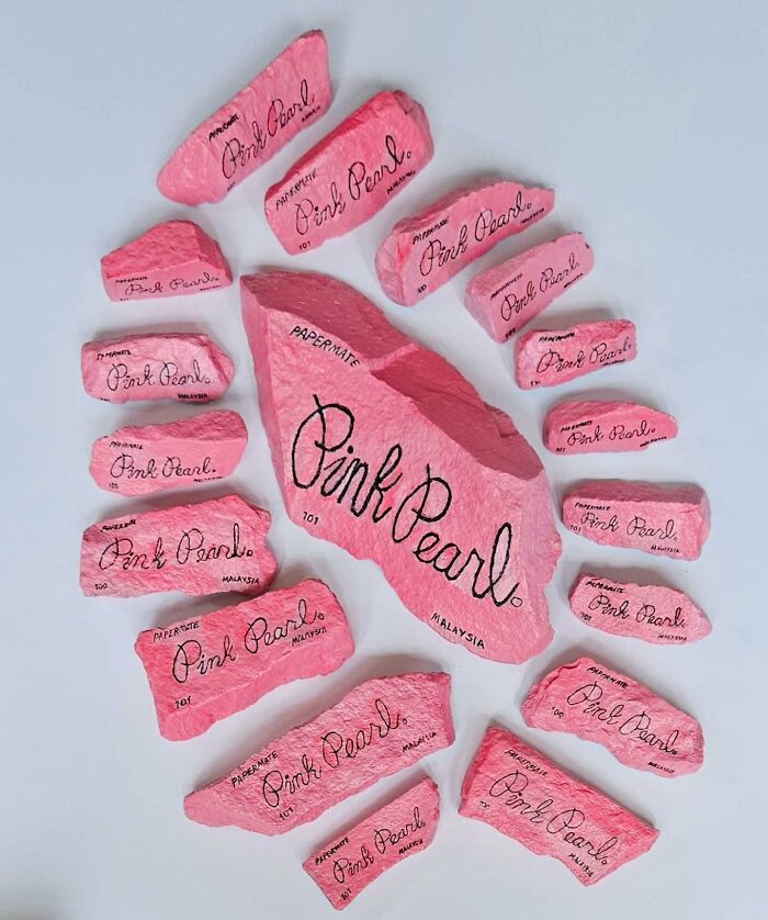 Colorful stone creations: rocks transformed into pink erasers of varying sizes, titled "Pink Pearl" by the artist.