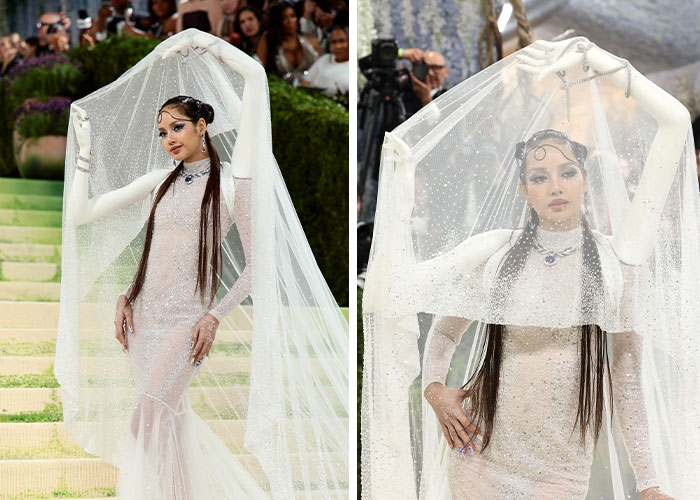 A celeb at Met Gala 2026 in a sparkling white dress and veil, featuring extra arms and hands.