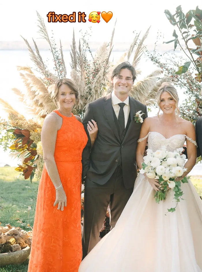 Mother-in-law's dress edited to orange in the wedding photo, bride and groom smiling. Mother-in-law's dress edited to orange in the wedding photo, bride and groom smiling.