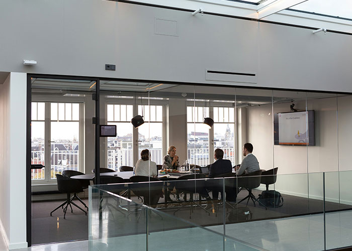 Business meeting in modern office related to JPMorgan employee case Business meeting in modern office related to JPMorgan employee case