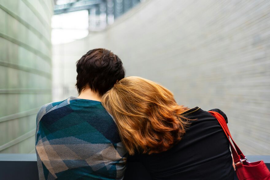 Two people comforting each other showing happy crying moments