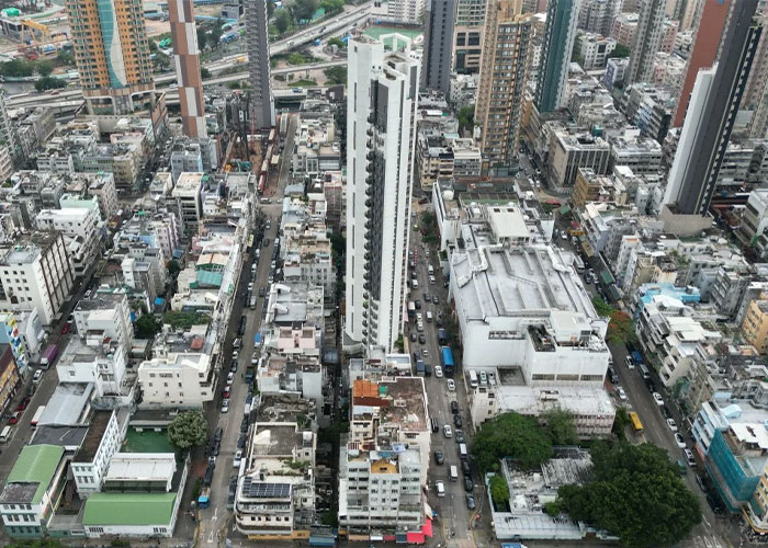 Aerial cityscape of dense buildings and streets in urban area