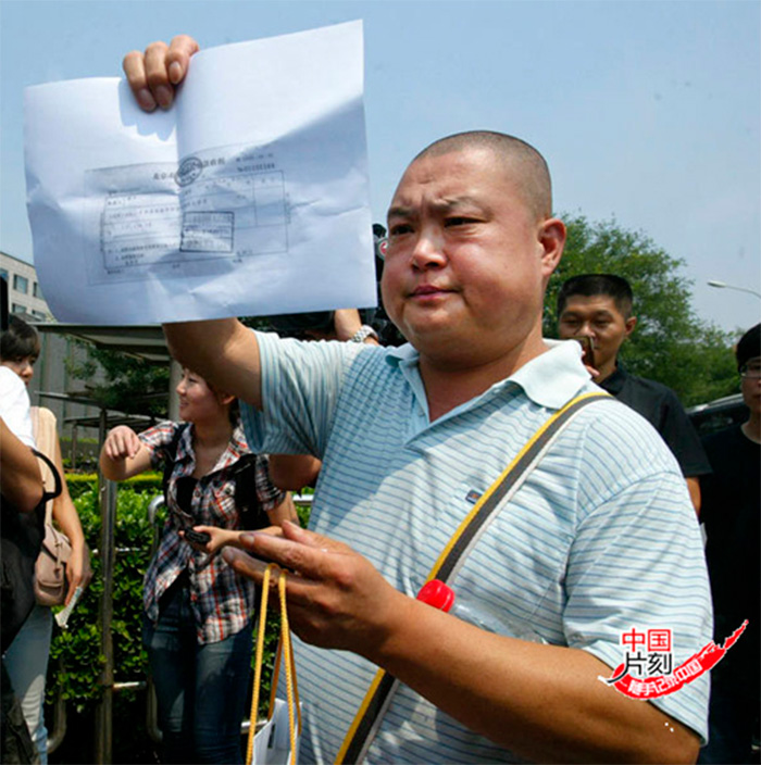 Man holding forged hospital records related to dialysis treatment arrest Man holding forged hospital records related to dialysis treatment arrest