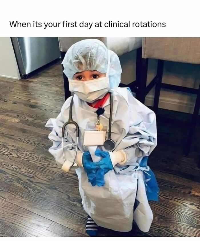 A child in oversized scrubs, surgical cap, and mask, holding a stethoscope, representing medical memes for doctors.