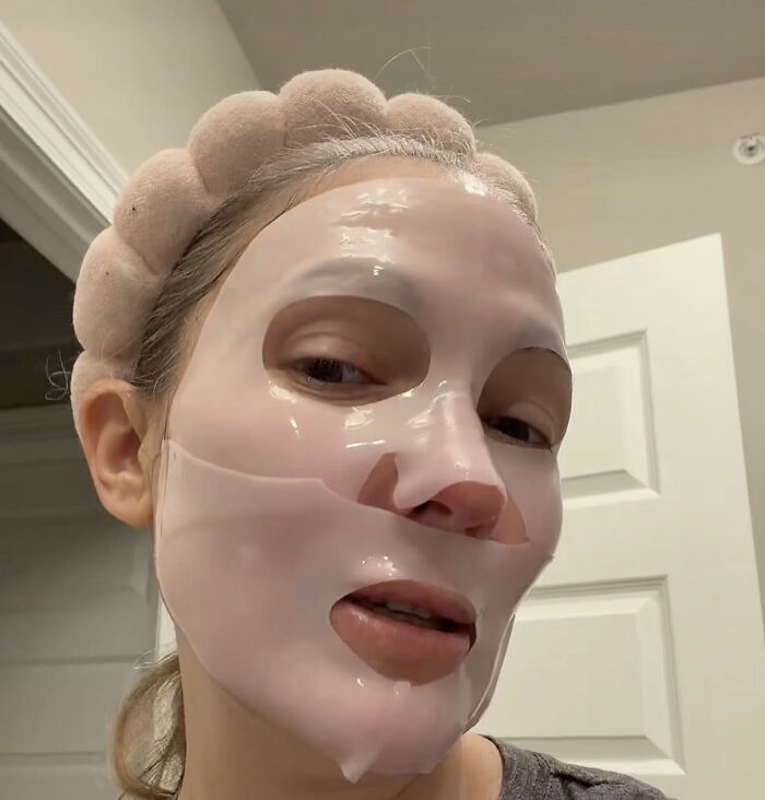 Woman with a pink sheet mask and a puffy headband. Perfect for last minute Mother's Day gifts.