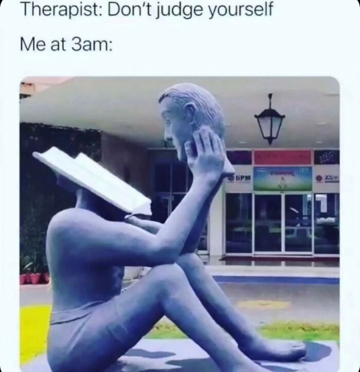 Funny random meme featuring a headless statue reading a book at 3am