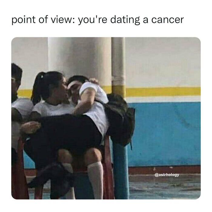 A couple embracing, the woman sitting on the man's lap, with text Point of view: you're dating a Cancer. Funny astrology memes.