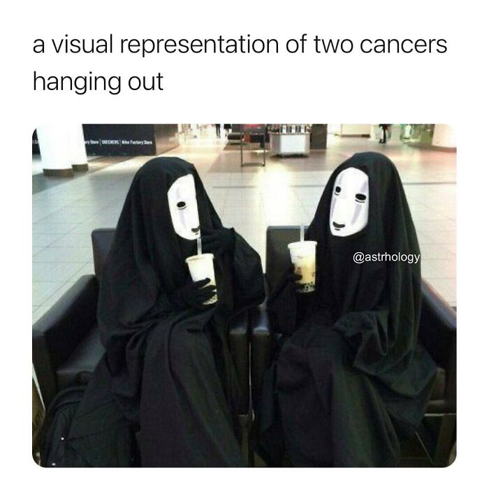Two figures in black cloaks and white masks, representing Cancer zodiac signs, drinking bubble tea. Funny astrology meme.