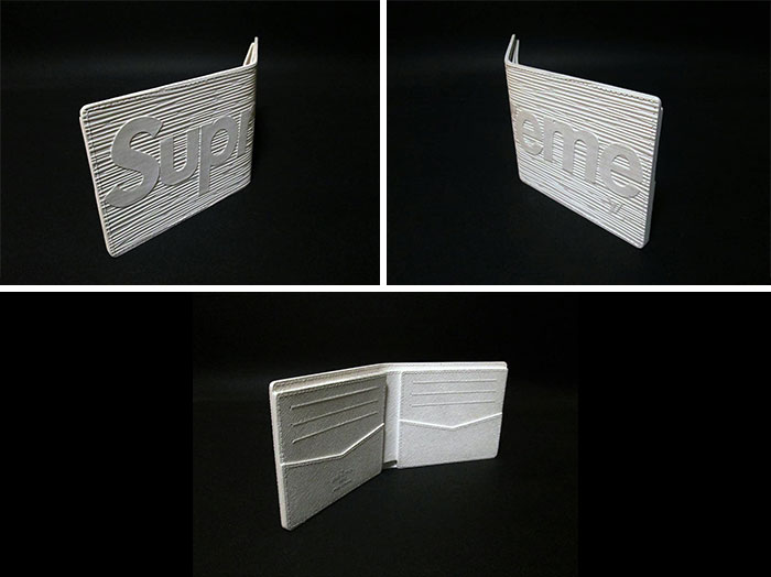 Paper wallet folded and open showing card slots and white textured design