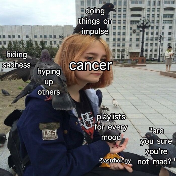 A young woman with ginger hair surrounded by pigeons, symbolizing relatable and funny astrology memes for the Cancer zodiac sign.