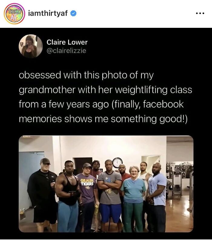 Grandmother posing with weightlifting class showing inspiring wholesome moments