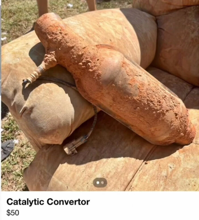 Rusty catalytic converter on old couch in Appalachian mountain towns