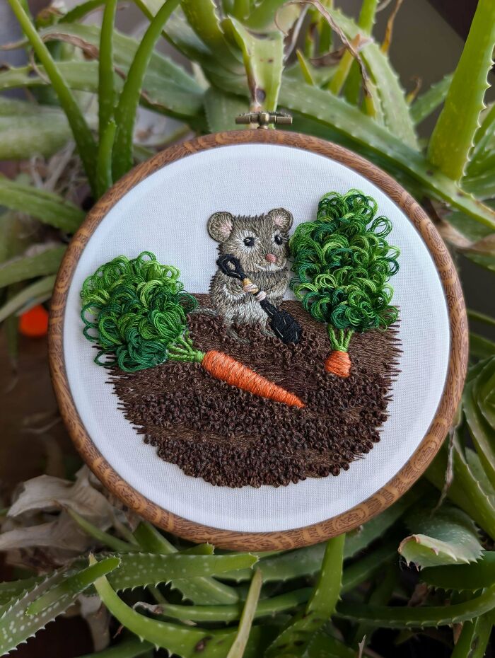Charming embroidery projects depicting a cute little mouse holding a shovel next to a carrot in a hoop