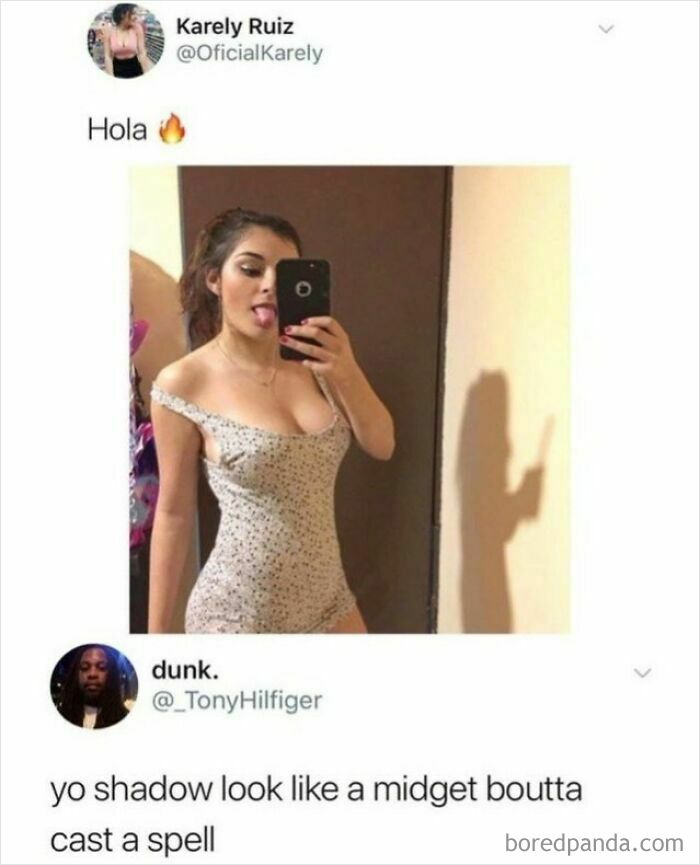 A girl takes a selfie, sticking out her tongue. Her shadow behind her casts a unique shape, a rare burn.