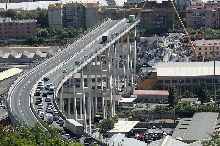 Urban hell bridge collapse and traffic congestion in city scene