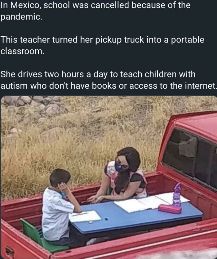 A teacher and student in a red pickup truck, a wholesome scene of learning amid challenging times. She teaches children with autism.
