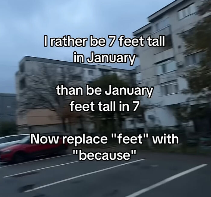 A viral typo meme over a parking lot and buildings, playing with words: feet and because. It's a stroke of genius!