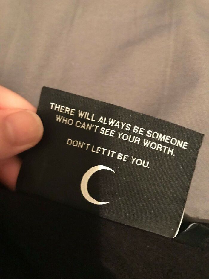 A person's fingers holding a clothing tag that reads, There will always be someone who can't see your worth. Don't let it be you, with a crescent moon below. A wholesome pic for inspiration.