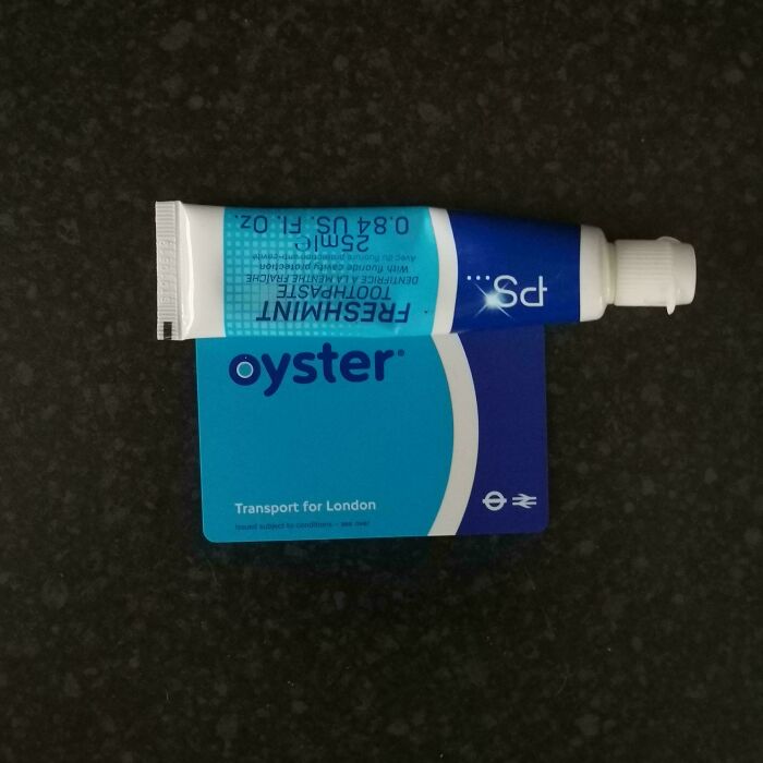 An accidental color match: a blue Freshmint toothpaste tube aligns perfectly with a blue Oyster card, reducing cortisol levels.
