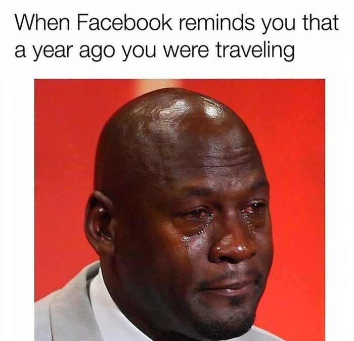 A famous travel meme of Michael Jordan crying, with text above, for when Facebook reminds you of past travel.