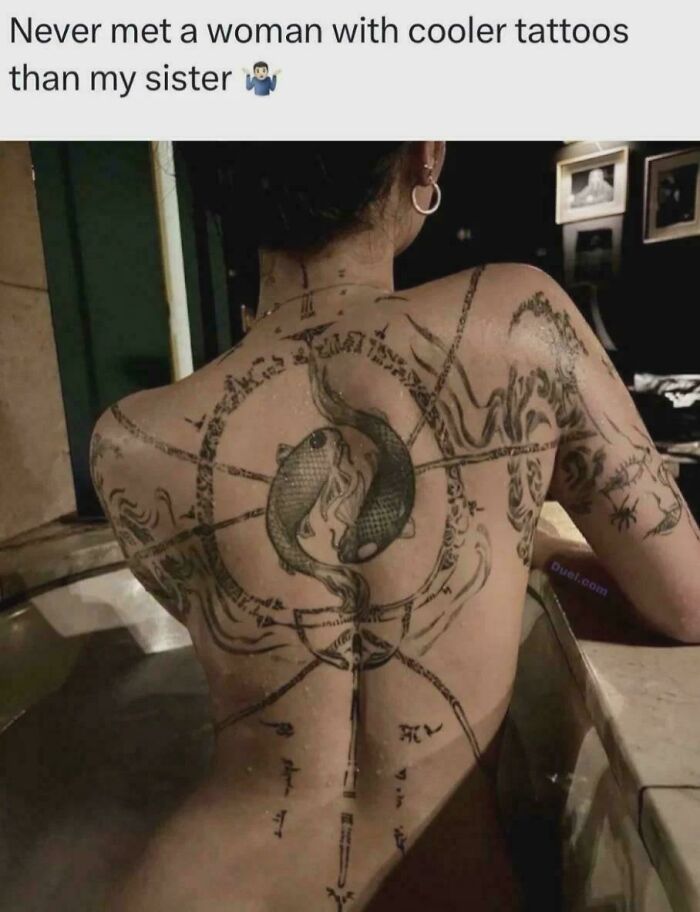 Promeia And The Yin Yang Fish Tattoo