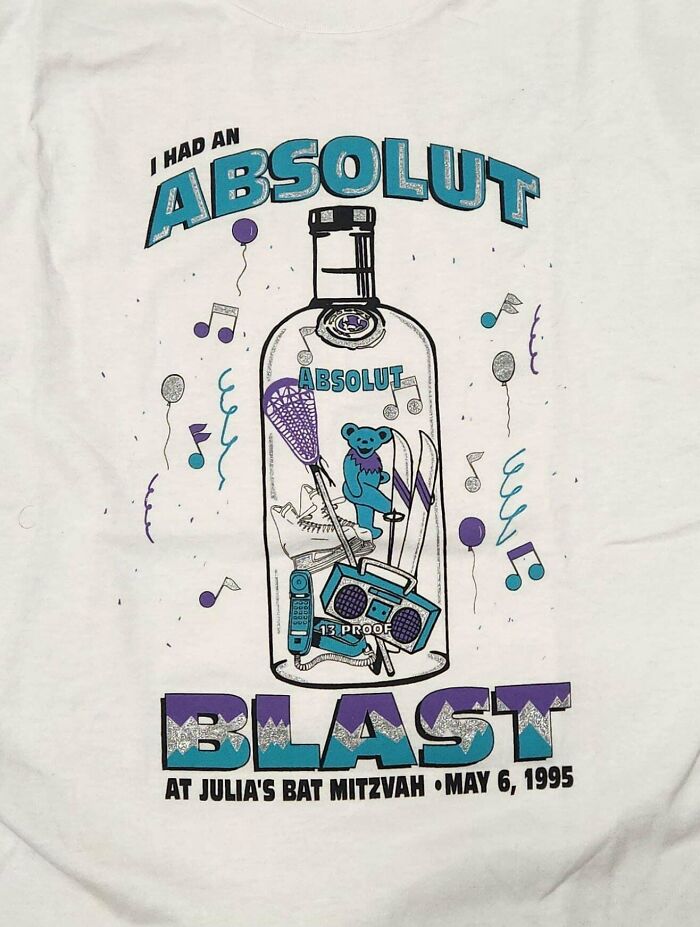 A white t-shirt features an Absolut Blast design for a bat mitzvah, a cool thrift store jackpot.