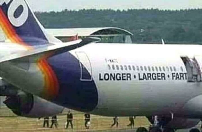 A white airplane with text "LONGER LARGER FART" on its side, a funny example of premature truncation.