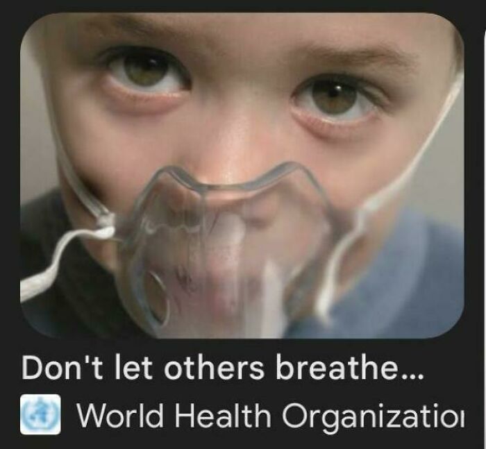 Close-up of a child wearing an oxygen mask, eyes wide. The image has a humorous caption about premature truncation.
